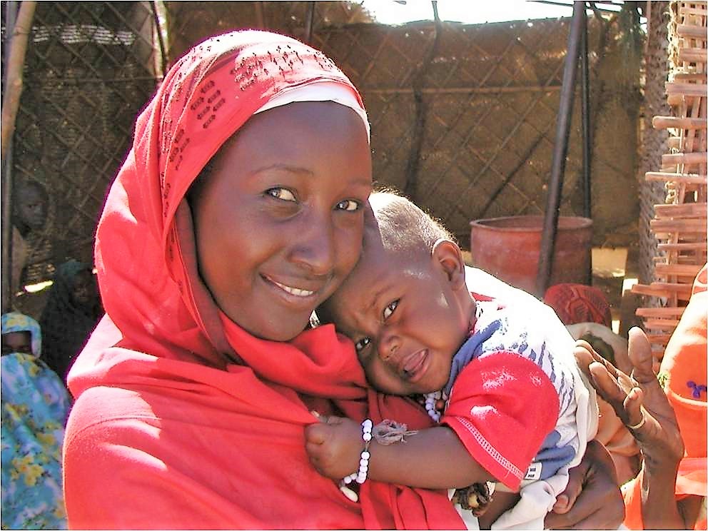 Healthy Baby & mother – goat loan beneficiary good photo