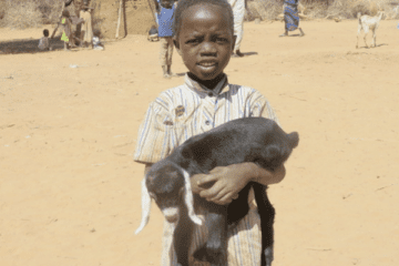 A Local boy with a Goat